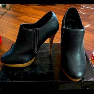 Black ankle booties with brown platform bottom